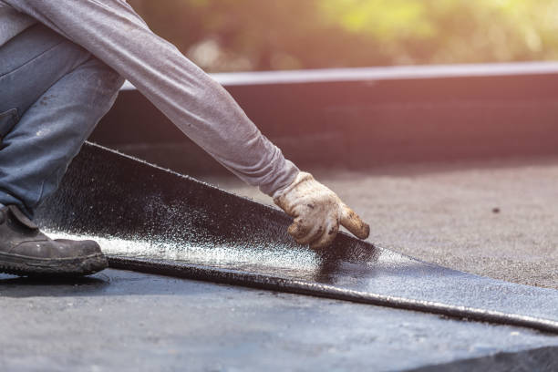 Professional Emergency Waterproofing technician working in Oswego, KS
